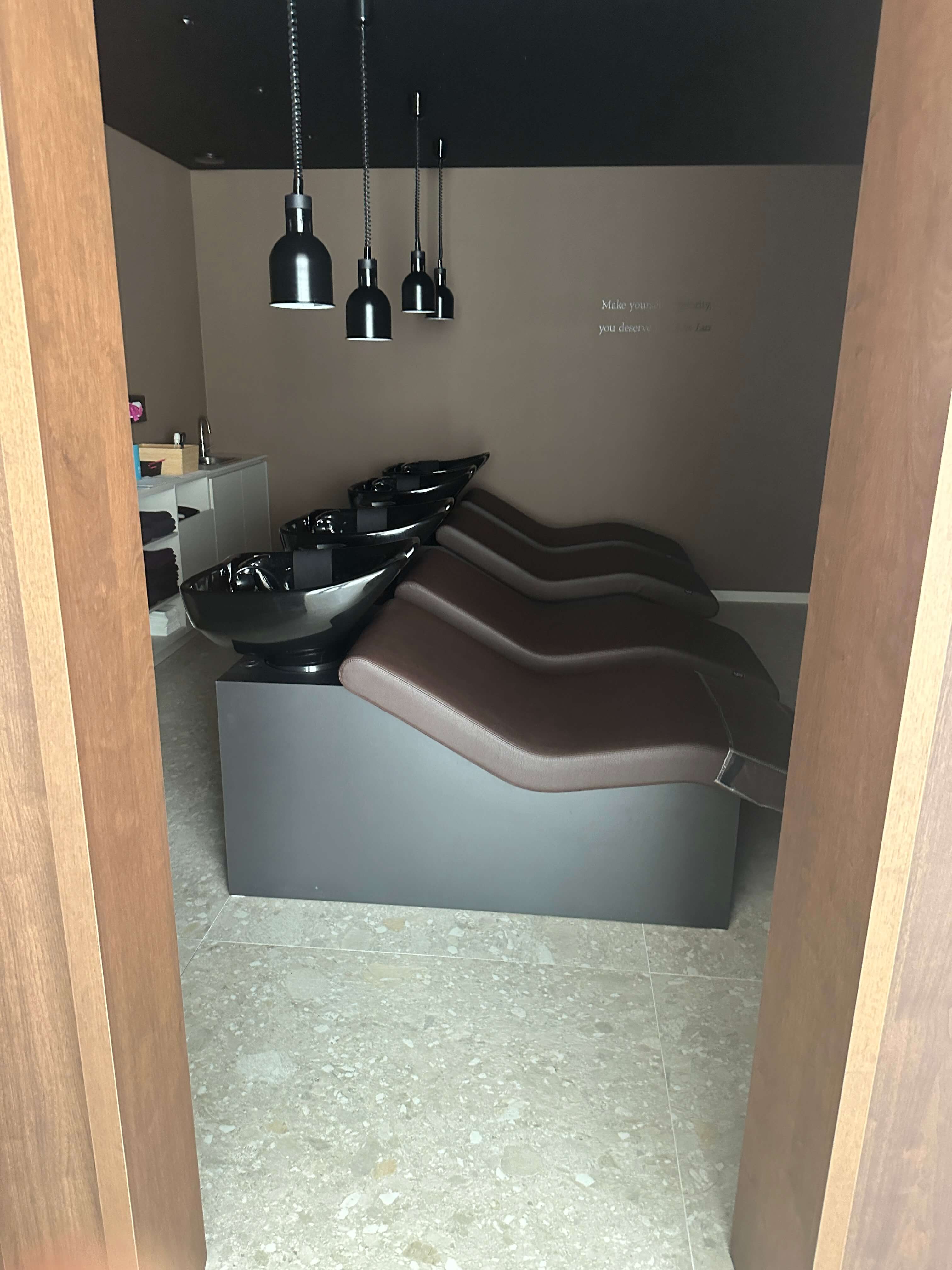 Modern massage room with microcement finish